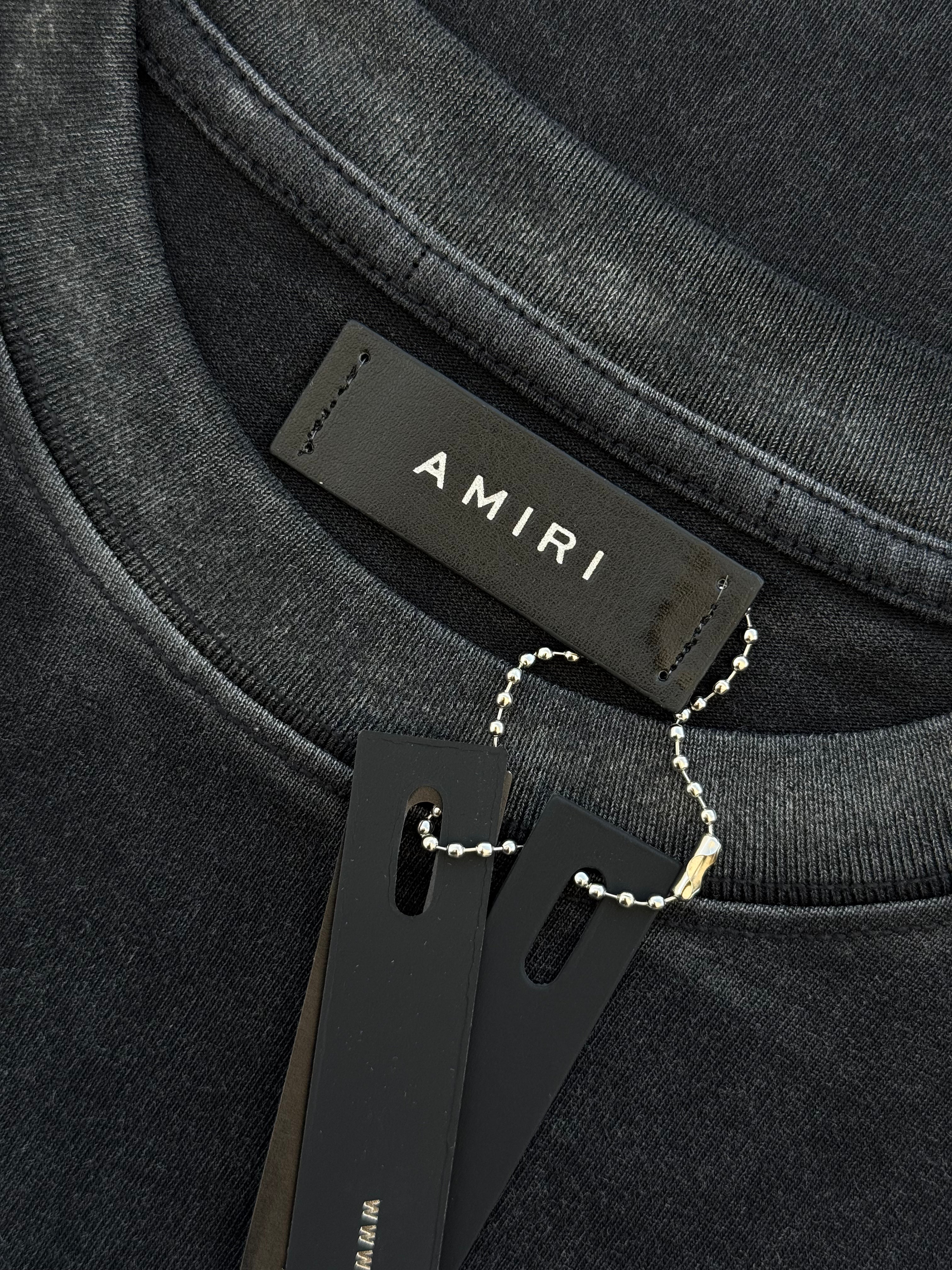 PLAYERA AMIRI