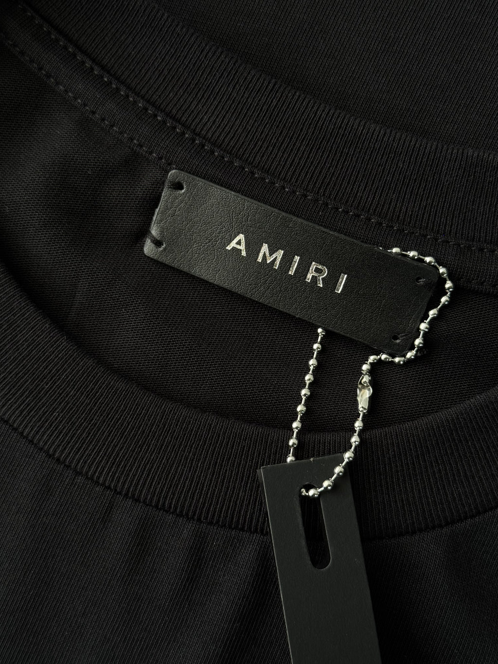 PLAYERA AMIRI