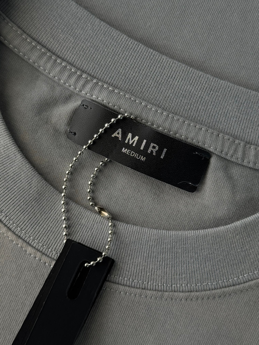 PLAYERA AMIRI